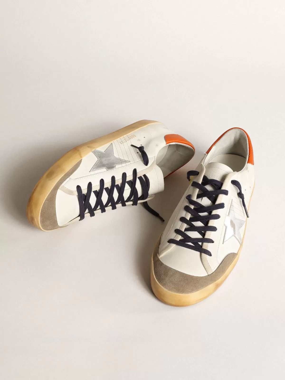 Sale Golden Goose Super-Star Penstar con stella argento e talloncino arancione