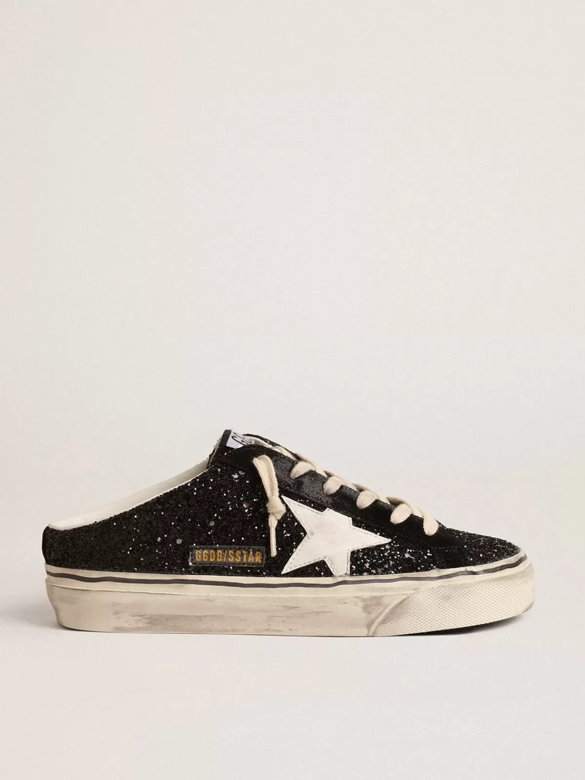 Outlet Golden Goose Super-Star Sabot in glitter neri con stella bio-based bianca